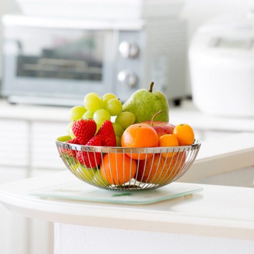 Fruit basket in bright kitchen; Shutterstock ID 1047379687; Job (TFH, TOH, RD, BNB, CWM, CM): TOH